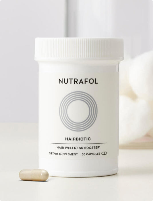 Nutrafol Hairbiotic hair supplement container on a white background